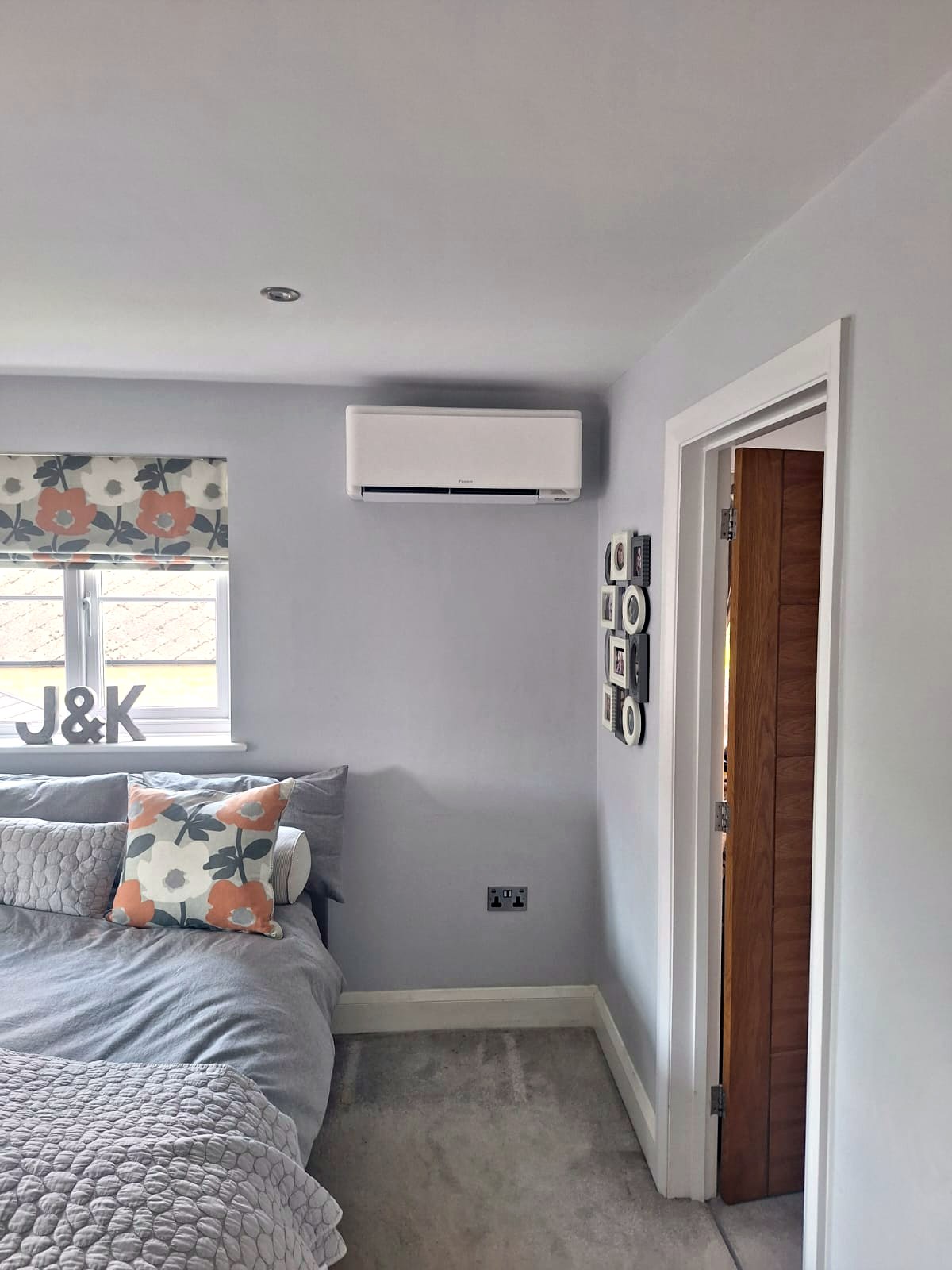 Wall mounted unit fitted high on the wall of a finished room
